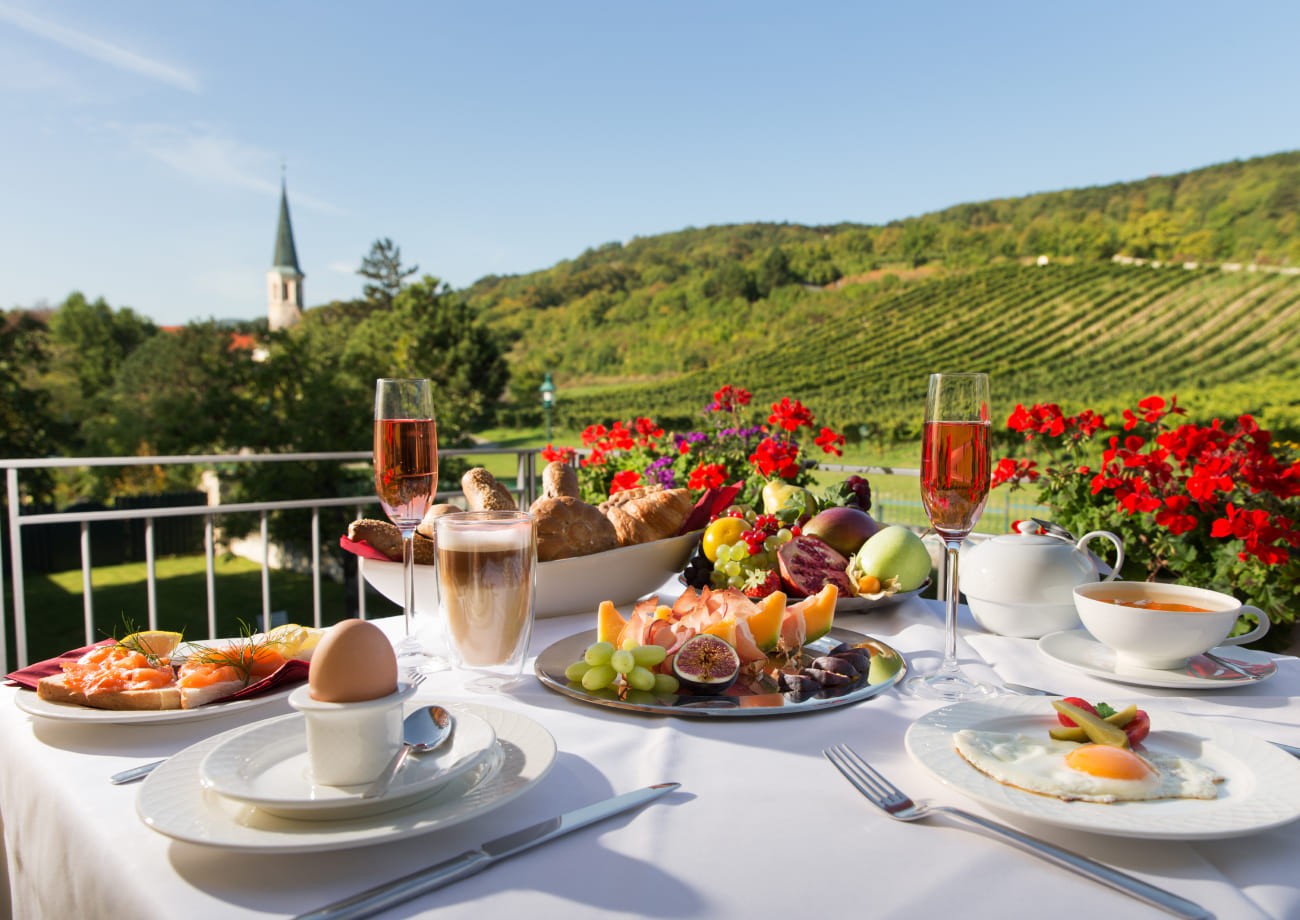 Enjoy breakfast on the sunny terrace of Hotel Turmhof