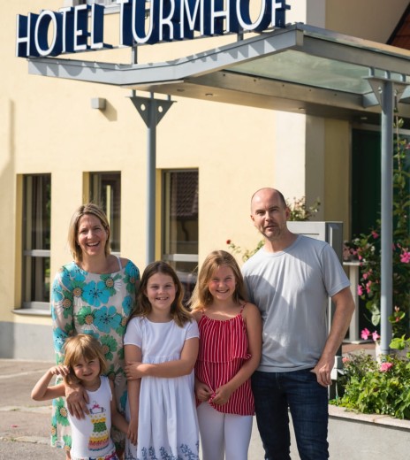 Host family Köckeis-Grüner in front of Hotel Turmhof
